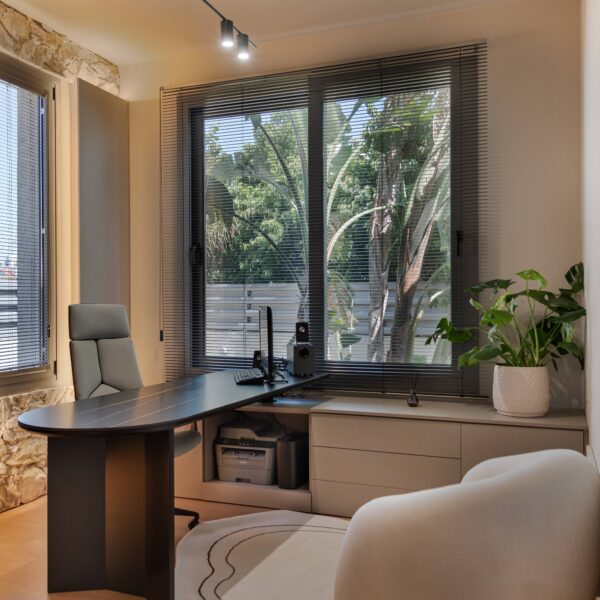 Luxury home office design in Nicosia with modern minimalist style by Migliore Interiors Custom built-in cabinetry and shelving in a contemporary Cyprus office interior Elegant office desk and ergonomic seating in Migliore Nicosia No. 14 project Warm ambient lighting and hidden cove lights in a luxury Nicosia office space Refined material palette with wood tones and matte finishes in a modern home office Minimalist office layout with natural light and bespoke storage solutions in Nicosia Luxury Cyprus interior design featuring functional workspace and elegant details Contemporary home office retreat with calm, refined atmosphere by Migliore Interiors