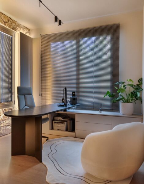 Luxury home office design in Nicosia with modern minimalist style by Migliore Interiors Custom built-in cabinetry and shelving in a contemporary Cyprus office interior Elegant office desk and ergonomic seating in Migliore Nicosia No. 14 project Warm ambient lighting and hidden cove lights in a luxury Nicosia office space Refined material palette with wood tones and matte finishes in a modern home office Minimalist office layout with natural light and bespoke storage solutions in Nicosia Luxury Cyprus interior design featuring functional workspace and elegant details Contemporary home office retreat with calm, refined atmosphere by Migliore Interiors