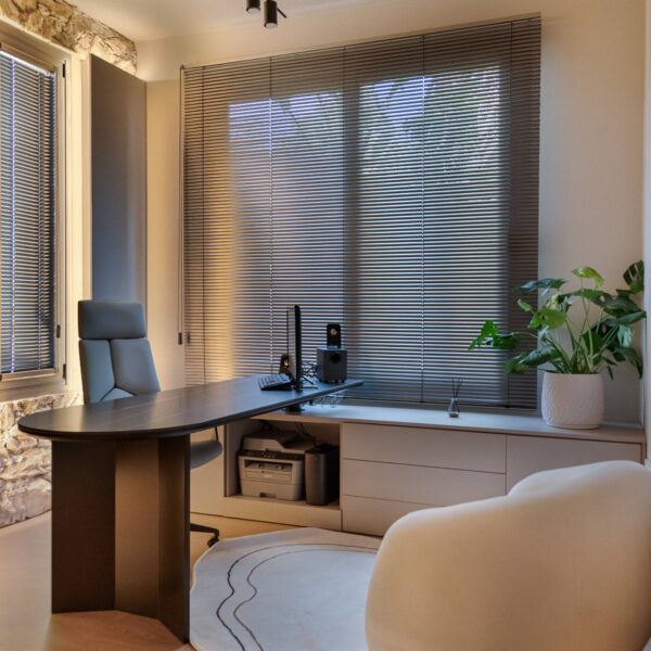Luxury home office design in Nicosia with modern minimalist style by Migliore Interiors Custom built-in cabinetry and shelving in a contemporary Cyprus office interior Elegant office desk and ergonomic seating in Migliore Nicosia No. 14 project Warm ambient lighting and hidden cove lights in a luxury Nicosia office space Refined material palette with wood tones and matte finishes in a modern home office Minimalist office layout with natural light and bespoke storage solutions in Nicosia Luxury Cyprus interior design featuring functional workspace and elegant details Contemporary home office retreat with calm, refined atmosphere by Migliore Interiors