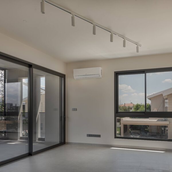 Modern open-plan living area in Migliore Nicosia No. 18 – Flat B Contemporary kitchen design with neutral tones in Nicosia flat Spacious dining area featuring minimalist furniture layout Cozy bedroom with high-quality materials and functional design Stylish bathroom with modern fixtures and clean lines