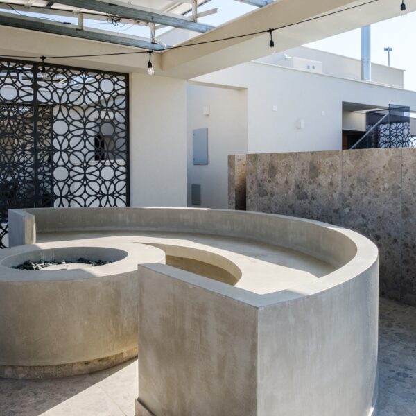 “After – Rooftop garden with natural stone paving and seating area” “After – Timber pergola shading outdoor lounge on roof terrace” “After – Built-in planter beds with greenery in rooftop design” “After – Evening rooftop garden with ambient outdoor lighting” “After – Detail of stone paving and glass railing overlooking Nicosia